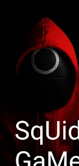 Mysterious red hooded figure on dark background wallpaper.