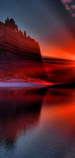 Dramatic red sunset landscape with water reflection.