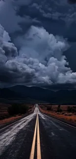 Dark storm clouds over a long road.