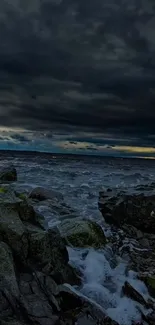 Dramatic seascape with stormy sky and rugged rocks.