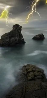 Rocky seascape with lightning in stormy sky.