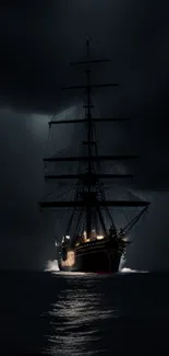 Dramatic ship sailing under a dark sky on the ocean at night.