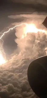 Mobile wallpaper of a lightning storm seen from an airplane.