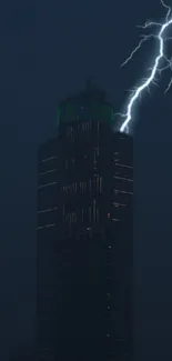 Lightning bolt striking skyscraper at night, dark blue cityscape.