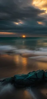 Dramatic sunset over a wavy beach with dark clouds and ocean view.