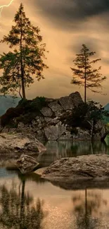 Dramatic sunset over a serene lake with trees and rocky formations.