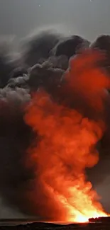 Dramatic fiery volcanic eruption with smoke.