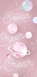 Pastel pink wallpaper with planets and inspirational text.