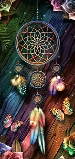 Dreamcatcher with colorful butterflies and roses on a wooden background.