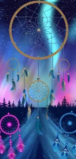 Dreamcatcher with aurora and dark forest background on mobile wallpaper.