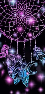 Neon dreamcatcher with pink and blue feathers glowing in the dark.