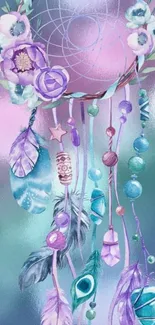 Dreamcatcher with feathers and flowers in pastel colors.