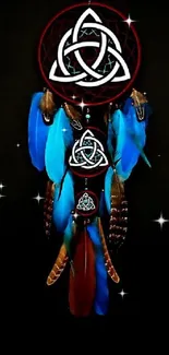 Dreamcatcher with blue feathers on a dark background.