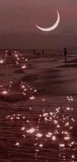 Crescent moon over a glittering beach night scene.