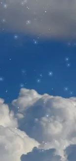 Fluffy clouds against a blue sky with stars scattered throughout.