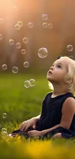 Child gazing at bubbles in a sunny meadow.