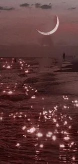 Crescent moon over calm beach with shimmering water reflections.