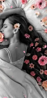 Woman sleeping on bed with pink flowers in hair.