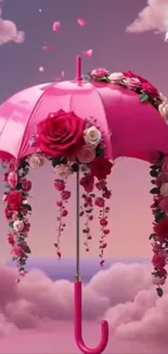 Whimsical pink umbrella with flowers and birds in a fantasy sky.