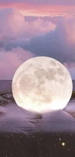 Dreamy full moon rising over soft clouds.