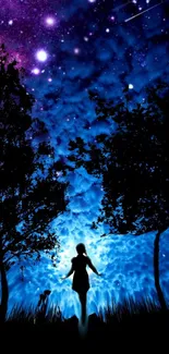 Silhouette under a vivid starry night sky with blue and purple hues.