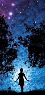 Silhouette of a girl under a vibrant, starry night sky with trees.