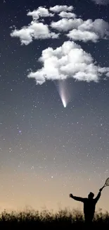 Silhouette under a starry sky with comet and clouds.