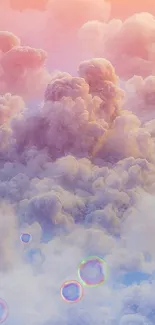 Dreamy pastel cloudscape mobile wallpaper with soft hues of pink and orange.