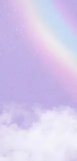 Dreamy pastel sky with rainbow and clouds wallpaper.