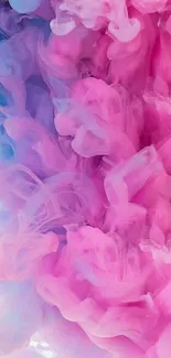 Dreamy pink and blue cloud abstract wallpaper.