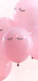 Five pink balloons with closed eyes design as a mobile wallpaper.