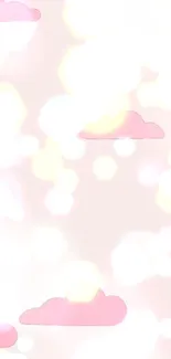 Dreamy wallpaper with pink clouds and light bokeh effects.