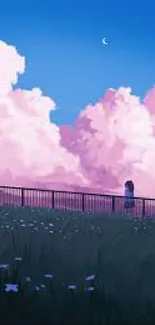 Mobile wallpaper of pink clouds against a vibrant blue sky with grassy foreground.