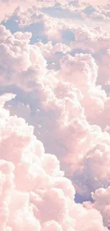 Mobile wallpaper of dreamy pink clouds in a serene pastel sky.