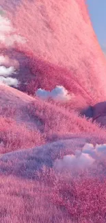 Pastel pink hills with fluffy clouds and soft textures for mobile wallpaper.