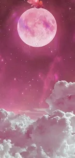 Dreamy pink sky with a moon and fluffy clouds.