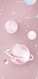 Dreamy pink wallpaper with planets and stars on a mobile phone screen.