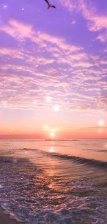 Lavender-hued sunset over ocean waves with a serene, dreamy sky backdrop.