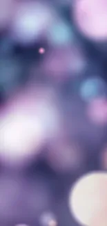 Dreamy purple bokeh wallpaper with soft, pink blurred lights.