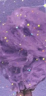 Purple cotton candy with stars on a textured background.