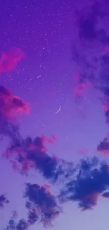 Purple sky with crescent moon and clouds.