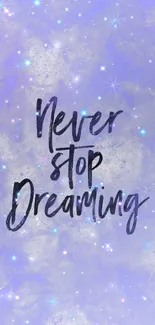 Purple wallpaper with 'Never stop dreaming' text surrounded by stars.