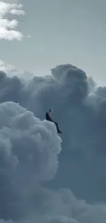 Person sitting on fluffy clouds against a blue-gray sky.