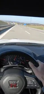 Dynamic view of highway driving from car interior.