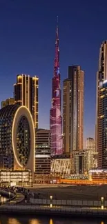 Dubai skyline at night with illuminated skyscrapers and reflections.