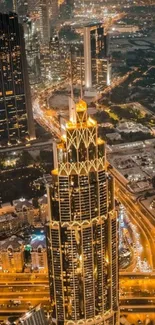 Aerial view of Dubai skyline at night with illuminated skyscrapers.