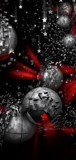 Abstract wallpaper with metallic spheres on a red and black background.