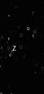 Floating alphabet letters on a black background wallpaper.