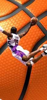 Basketball player dunking against a large, vibrant orange basketball backdrop.