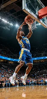 Basketball player performing a slam dunk in a vibrant indoor arena.